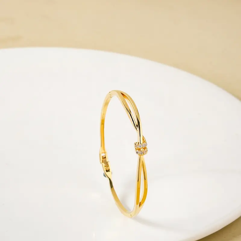 Artisan-Knotted Vine Motif Gold Bracelet 1