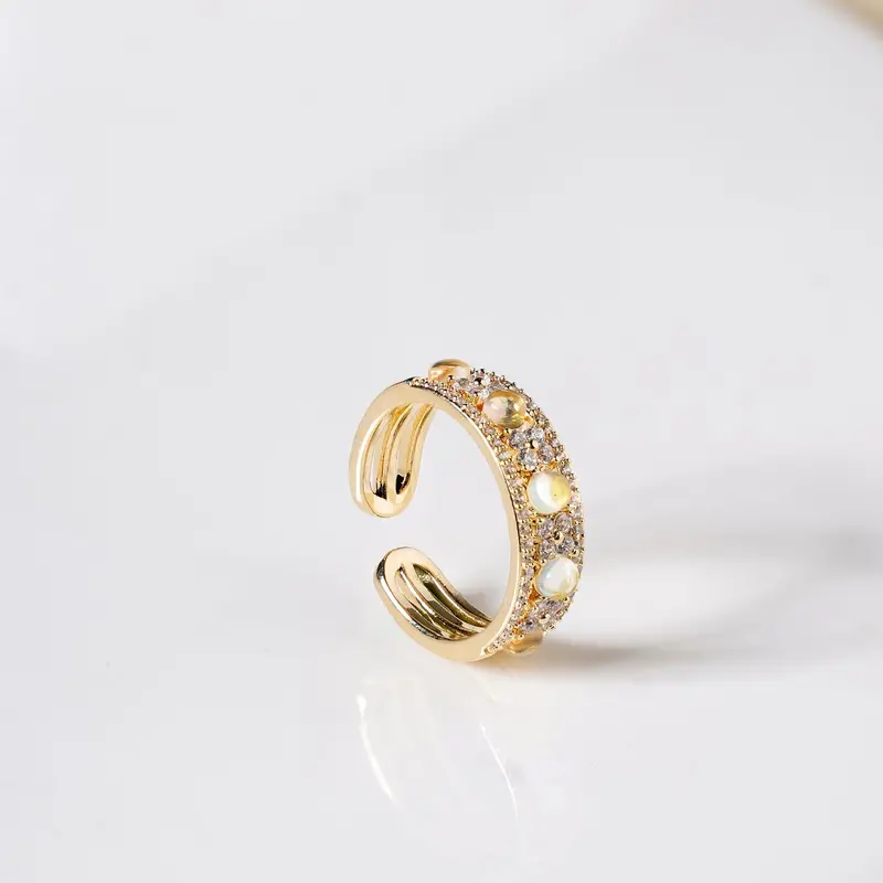Gemstone-Embellished Gold Thumb Ring 1