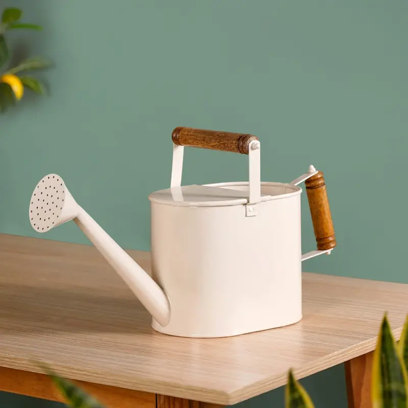 Glossy Blue Metal Plant Watering Can With Dual Wooden Handles 1
