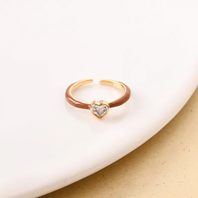 Heart-Shaped Ring Combining Brown And Gold Elements 1