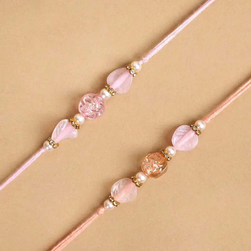 Peach & Pink Beaded Rakhi Set – Dual-Piece Festive Pairing 1