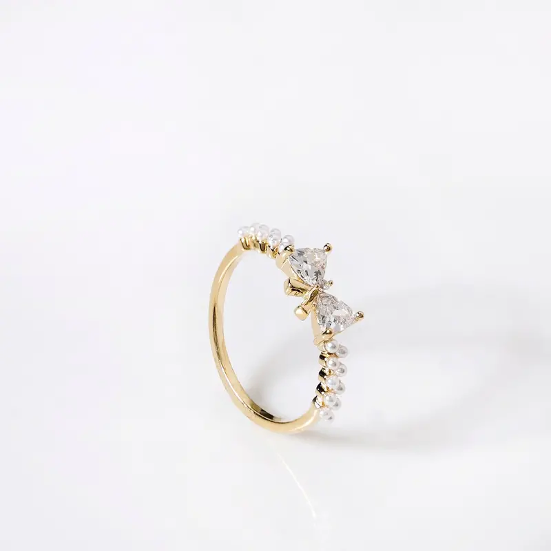 Pearl-And-Bow Charm Gold Stackable Ring 1
