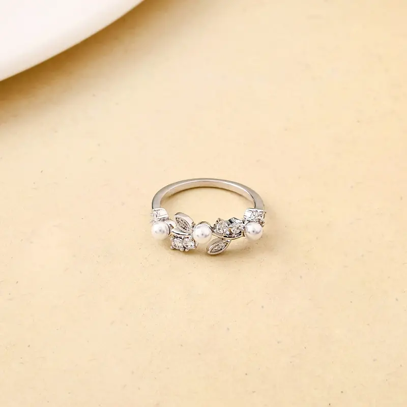 Silver Dewdrop Leaf Ring Featuring Pearl Detail 1